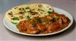 en tallerken med Chicken Tikka Masala