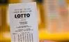 hånd holder lotto-kupon