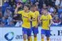 Tre Brøndbyspillere jubler over en scoring