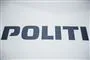 blål logo påhvid baggrund POLITI