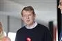 portræt af mand i sweater og briller