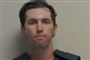 Utahs departement for offentlig sikkerhed har fredag offentliggjort politiets "mugshot" af Tyler Robinson.