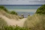 en strand i sol