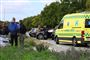 ambulance ved to smadrede biler