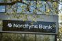 bygninng med skilt "Nordfyns Bank"
