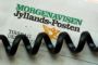 Telefonledning henover forside af avis