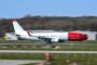 et fly i fart på landingsbanen