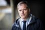 Portrær af mand i skjorte og slips