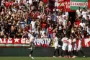 fodboldspillere i aktion