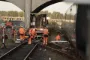 personale arbejder ved afsporet tog