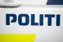 politilogo på siden af bil