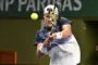 tennisspiller i aktion
