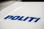 politibil med påskriften politi
