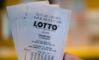 hånd holder lotto-kupon