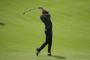 golfspiller i aktion