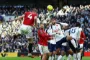 Unitedspiller header til en bold