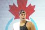 Penny Oleksiak  i sort badedragt og med sort badehætte
