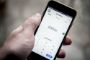 en mobil med mobilepay på skærmen
