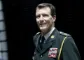 prins joachim i uniform med mørk baggrund