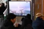 Mennesker kigger på tv