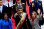 Maduro med mørk jakke og ordener over skulderen