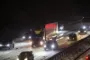 biler på snedækket motorvej