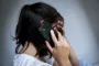 person taler i telefon