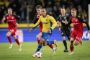 fodboldspillere i aktion
