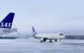 fly på sneklædt landingsbane