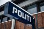 Politiskilt ved bygning