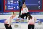 Curlingkvinder på banen