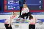 Curlingkvinder på banen