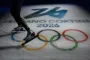 en speedskater og et ol-logo