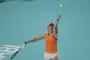 en tennisspiller på banen