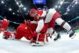 Ishockeyspillere på banen