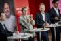 Personer på pressemøde