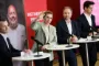 Personer på pressemøde