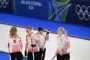 curlingspillere på isen