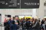 Personer i lufthavn