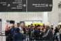 Personer i lufthavn