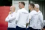 Tre mænd på fodboldbane