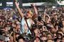 Der er penge at spare ved at købe din Roskilde-festival-billet i udlandet. 
 Foto: AP/John McConnico / POLFOTO