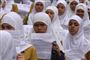 Filipinske piger iført den traditionelle muslimske hovedbeklædning hijab.
 Foto: AP: BULLIT MARQUEZ / POLFOTO