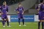 Skuffende Fiorentina-spillere. Per Krøldrup anes i baggrunden. 
 Foto: AP/Peter Dejong / POLFOTO