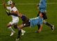 Nicola Legrottaglie snupper bolden foran USA's Charlie Davies 
 Foto: AP/Rebecca Blackwell / POLFOTO