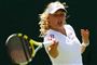 Caroline Wozniacki er klar til anden runde i Wimbledon trods besvær.
 Foto: AP/Kirsty Wigglesworth / POLFOTO