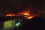 Flammer bredte sig hurtigt til et større område efter togulykken.
 Foto: AP / Riccardo Dalle Luche / POLFOTO