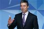 Anders Fogh Rasmussen indleder sit nye job med at hive de ansatte tidligere ud af sengen.
 Foto: AP/Yves Logghe / POLFOTO