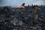 Her er billederne: Malaysisk fly styrtet ned i Ukraine