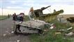 Her er billederne: Malaysisk fly styrtet ned i Ukraine